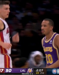  巴特勒三双热火加时险胜尼克斯  